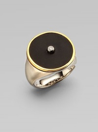 From the Nile Collection. A dramatic disc of black onyx is centered with one sparkling white topaz, framed in gleaming goldplate and set atop a brushed sterling silver band.Black onyx and white topazSterling silverGoldplatedDiameter, about ¾Imported From the Nile Collection. A dramatic disc of black onyx is centered with one sparkling white topaz, framed in gleaming goldplate and set atop a brushed sterling silver band.Black onyx and white topazSterling silverGoldplatedDiameter, about ¾Imported