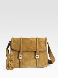Suede bag with flap closure.Adjustable shoulder strap, 17½-20 dropTurnlock flap closureTwo inner compartmentsOne inside zip pocketThree inside open pocketsSatin lining11W X 8½H X 4DMade in Italy Suede bag with flap closure.Adjustable shoulder strap, 17½-20 dropTurnlock flap closureTwo inner compartmentsOne inside zip pocketThree inside open pocketsSatin lining11W X 8½H X 4DMade in Italy
