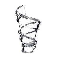 Designed by Thomas Bastide for Baccarat, this exquisite crystal vase makes a bold statement with its dramatic spiral design. It looks equally beautiful alone or filled with flowers. Designed by Thomas Bastide for Baccarat, this exquisite crystal vase makes a bold statement with its dramatic spiral design. It looks equally beautiful alone or filled with flowers.
