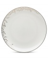 Fringed with shimmering leaves of platinum and mica, this bone china bread and butter plate turns your table into a springtime utopia. Its sleek coupe shape is a vision of modern elegance in platinum-banded white.