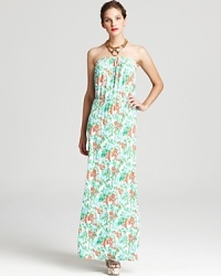Everyone loves a dress that looks just as good as a cover-up on the beach as it does at a formal garden party, that's why this bright Lilly Pulitzer floral maxi is in high demand with the style set. Everyone loves a dress that looks just as good as a cover-up on the beach as it does at a formal garden party, that's why this bright Lilly Pulitzer floral maxi is in high demand with the style set.