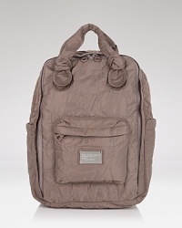 Carry your schoolday essentials in chic style with this logo-stitched backpack from MARC BY MARC JACOBS. Carry your schoolday essentials in chic style with this logo-stitched backpack from MARC BY MARC JACOBS.