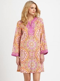 A spring-inspired design crafted of lightweight pure cotton, impeccably-finished with sharp solid trim at the neckline and cuffs. Split jewel necklineLong sleevesDouble solid trim at neckline and cuffsAbout 36 from shoulder to hemCottonMachine washImported A spring-inspired design crafted of lightweight pure cotton, impeccably-finished with sharp solid trim at the neckline and cuffs. Split jewel necklineLong sleevesDouble solid trim at neckline and cuffsAbout 36 from shoulder to hemCottonMachine washImported