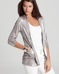 This shimmery GUESS blazer lends a major dose of glam to every look, from weekend basics to after-dark frocks. This shimmery GUESS blazer lends a major dose of glam to every look, from weekend basics to after-dark frocks.