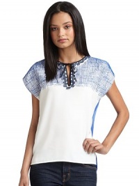 THE LOOKEmbroidered detail in frontFront keyhole with tie closureCap sleevesTHE FITAbout 24 from shoulder to hemTHE MATERIALPolyesterSecond fabric: SilkFully linedCARE & ORIGINDry cleanImportedModel shown is 5'10½ (179cm) wearing US size Small. THE LOOKEmbroidered detail in frontFront keyhole with tie closureCap sleevesTHE FITAbout 24 from shoulder to hemTHE MATERIALPolyesterSecond fabric: SilkFully linedCARE & ORIGINDry cleanImportedModel shown is 5'10½ (179cm) wearing US size Small.