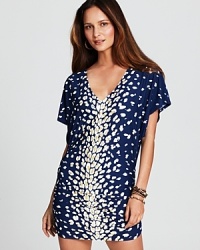 Expect the unexpected from this coverup from Carmen Marc Vavlo, which features a splash of spots and a breezy shape. It's deep v-neck is perfect for showing off your suit, while the bold print hints at your wild side. Expect the unexpected from this coverup from Carmen Marc Vavlo, which features a splash of spots and a breezy shape. It's deep v-neck is perfect for showing off your suit, while the bold print hints at your wild side.