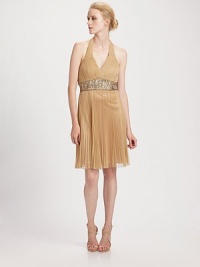 This pleated halter style is embellished with a prettily beaded panel at the waist.Halter neckline with tie closureBeaded midriff panelPleated skirtConcealed side zipFully linedAbout 20 from natural waist90% nylon/10% polyesterSpot cleanImportedModel shown is 5'10½ (179cm) wearing US size 4. This pleated halter style is embellished with a prettily beaded panel at the waist.Halter neckline with tie closureBeaded midriff panelPleated skirtConcealed side zipFully linedAbout 20 from natural waist90% nylon/10% polyesterSpot cleanImportedModel shown is 5'10½ (179cm) wearing US size 4.