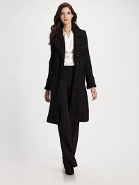 Modern wide-leg design, in subtly ribbed crepe marocain.Flat front High-waisted Zip fly with hook-and-eye closure Front creases Flared leg Inseam, about 36 63% triacetate/37% polyester Dry clean Made in USA of imported fabric Modern wide-leg design, in subtly ribbed crepe marocain.Flat front High-waisted Zip fly with hook-and-eye closure Front creases Flared leg Inseam, about 36 63% triacetate/37% polyester Dry clean Made in USA of imported fabric