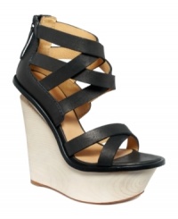 A view from the top. Survey your landscape in the towering Midori wedge sandals by L.A.M.B. With a 6-inch heel, this style is not for the shy. A view from the top. Survey your landscape in the towering Midori wedge sandals by L.A.M.B. With a 6-inch heel, this style is not for the shy.