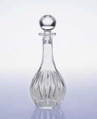 Dramatic cuts and a modern shape give this wine decanter a stunning flair. Topped by a beautiful crystal orb this decanter displays your fine wine in an equally fine setting. A wonderful gift for any oenophile. Dramatic cuts and a modern shape give this wine decanter a stunning flair. Topped by a beautiful crystal orb this decanter displays your fine wine in an equally fine setting. A wonderful gift for any oenophile.