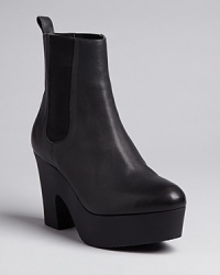 On-trend gored booties gain additional fashion leverage from modern, sculpted platforms, in distinctive, Loeffler Randall style. On-trend gored booties gain additional fashion leverage from modern, sculpted platforms, in distinctive, Loeffler Randall style.