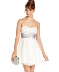 Twirl the night away in the perfect party dress from Speechless! Featuring a prominent satin sash and skirt of glittered tulle, this a-line frock is as sweet as it is chic. Twirl the night away in the perfect party dress from Speechless! Featuring a prominent satin sash and skirt of glittered tulle, this a-line frock is as sweet as it is chic.