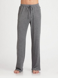 Smooth and soft, this versatile knit style can be worn at home or outdoors.Elastic drawstring waistSide slash pocketsInseam, about 3253% polyamide/47% viscoseMachine washImported Smooth and soft, this versatile knit style can be worn at home or outdoors.Elastic drawstring waistSide slash pocketsInseam, about 3253% polyamide/47% viscoseMachine washImported
