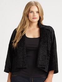 This stunning cropped design has the look of sculpted fur but is actually a velvety woven fabric with a pebbly texture and a subtle sheen.Stand collarOpen frontTapered shawl lapelsThree-quarter sleevesInverted back pleatFully linedAcetate/polyester/cotton/nylonDry cleanImported This stunning cropped design has the look of sculpted fur but is actually a velvety woven fabric with a pebbly texture and a subtle sheen.Stand collarOpen frontTapered shawl lapelsThree-quarter sleevesInverted back pleatFully linedAcetate/polyester/cotton/nylonDry cleanImported