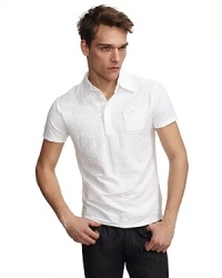 Lightweight short sleeve slub jersey polo shirt with snap pocket at chest. Lightweight short sleeve slub jersey polo shirt with snap pocket at chest.