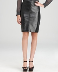 A careerist staple gets contemporary edge as sleek leather outfits a classic DKNY pencil skirt. Style with a concert tee and sharp blazer for a modern 9-to-5 statement. A careerist staple gets contemporary edge as sleek leather outfits a classic DKNY pencil skirt. Style with a concert tee and sharp blazer for a modern 9-to-5 statement.