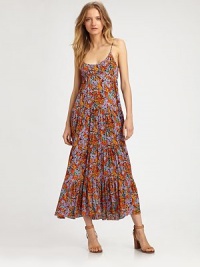 Slightly shirred maxi silhouette in a dainty floral print with a low back and slight hi-low hem. ScoopneckSpaghetti strapsLow backHi-low ruffle hemAbout 46 from natural waist53% viscose/47% rayonDry cleanImportedModel shown is 5'10 (177cm) wearing US size Small. Slightly shirred maxi silhouette in a dainty floral print with a low back and slight hi-low hem. ScoopneckSpaghetti strapsLow backHi-low ruffle hemAbout 46 from natural waist53% viscose/47% rayonDry cleanImportedModel shown is 5'10 (177cm) wearing US size Small.