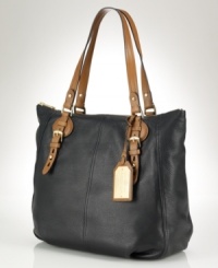 Designed in a softly structured silhouette from sumptuous textured leather, the Asher tote makes a sophisticated statement with luxe accents and sleek hardware. Designed in a softly structured silhouette from sumptuous textured leather, the Asher tote makes a sophisticated statement with luxe accents and sleek hardware.