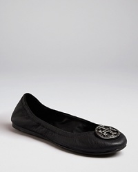 A beloved Tory Burch ballet flat accented with a crystal-encrusted logo plaque. A beloved Tory Burch ballet flat accented with a crystal-encrusted logo plaque.