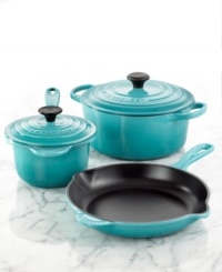 Learn to cook French. A charming mix of style and design, this cast iron collection equips your kitchen with incredible precision, performance and control. Advanced sand-colored enameled interiors exhibit superior heat distribution and retention, while colorful, durable exteriors resist the wear and tear of a busy space. Lifetime warranty. Learn to cook French. A charming mix of style and design, this cast iron collection equips your kitchen with incredible precision, performance and control. Advanced sand-colored enameled interiors exhibit superior heat distribution and retention, while colorful, durable exteriors resist the wear and tear of a busy space. Lifetime warranty.