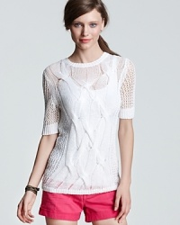 A sheer Theory sweater with cable knit through the front is a polished pairing to color-pop shorts. Hit the clubhouse in this eye-catching style! A sheer Theory sweater with cable knit through the front is a polished pairing to color-pop shorts. Hit the clubhouse in this eye-catching style!