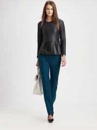Peplum hem and notched detail add feminine charm to this gleaming leather silhouette. CrewneckLong sleevesPeplum hemHidden back zipper93% silk/7% elastane liningLeatherDry clean with leather specialistImportedModel shown is 5'10 (177cm) wearing US size 2. Peplum hem and notched detail add feminine charm to this gleaming leather silhouette. CrewneckLong sleevesPeplum hemHidden back zipper93% silk/7% elastane liningLeatherDry clean with leather specialistImportedModel shown is 5'10 (177cm) wearing US size 2.