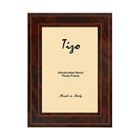 Exquisitely detailed with inlaid marquetry and a high gloss finish, these Italian wood frames offer a perfect way to showcase your pictures. Available in three sizes. Exquisitely detailed with inlaid marquetry and a high gloss finish, these Italian wood frames offer a perfect way to showcase your pictures. Available in three sizes.