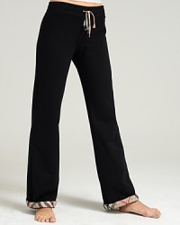 Bring cozy-luxe appeal to your weekends in these Burberry Brit pants. Team with coordinating hoodie for a relaxed look. Bring cozy-luxe appeal to your weekends in these Burberry Brit pants. Team with coordinating hoodie for a relaxed look.