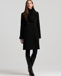 Relaxed haberdashery tailoring defines this Calvin Klein boyfriend coat, rendered in warm wool to keep you cozy all season long. Relaxed haberdashery tailoring defines this Calvin Klein boyfriend coat, rendered in warm wool to keep you cozy all season long.