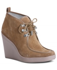 Step up you style with the gorgeous Penelope booties by Calvin Klein. With a lace-up vamp and rubber wedge, they'll make any look that much more fashionable. Step up you style with the gorgeous Penelope booties by Calvin Klein. With a lace-up vamp and rubber wedge, they'll make any look that much more fashionable.