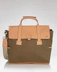 This innovative briefcase carries your creative ideas in style, from the canvas-leather double punch to the two-tone color scheme. This innovative briefcase carries your creative ideas in style, from the canvas-leather double punch to the two-tone color scheme.