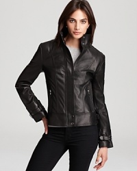 A polished version of the moto style, this Via Spiga leather jacket has all the edgy details you desire in a tailored silhouette you can work over a dress as easily as distressed denim. A polished version of the moto style, this Via Spiga leather jacket has all the edgy details you desire in a tailored silhouette you can work over a dress as easily as distressed denim.