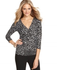What could be prettier than polka dots? Cable & Gauge's braided-front top puts a special twist on the trend of the season! What could be prettier than polka dots? Cable & Gauge's braided-front top puts a special twist on the trend of the season!
