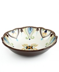 Streaked with Caribbean blue, grass green and rich terra cotta hues, the Amalfi serving bowl offers a quick escape to the shores of South America. From Vida by Eva Mendes dinnerware, the dishes have a scalloped, beaded edge in dark espresso that puts the rustic finishing touches on the hand-painted serveware. Streaked with Caribbean blue, grass green and rich terra cotta hues, the Amalfi serving bowl offers a quick escape to the shores of South America. From Vida by Eva Mendes dinnerware, the dishes have a scalloped, beaded edge in dark espresso that puts the rustic finishing touches on the hand-painted serveware.