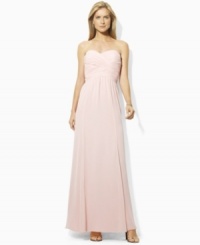 Exuding elegant glamour, the beautiful floor-grazing petite Lauren by Ralph Lauren gown is designed in lustrous silk-blend dupioni with a crossover sweetheart neckline for feminine charm. Exuding elegant glamour, the beautiful floor-grazing petite Lauren by Ralph Lauren gown is designed in lustrous silk-blend dupioni with a crossover sweetheart neckline for feminine charm.