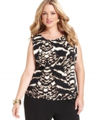 Calvin Klein's bold take on animal print dresses up this plus size shell. Pair it with suit separates for a ready-made work look. Calvin Klein's bold take on animal print dresses up this plus size shell. Pair it with suit separates for a ready-made work look.