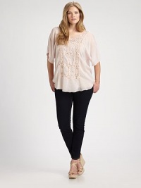 This vintage-inspired style features awe-inspiring lace and a self-tie detail to define the waist. Pair this dolman-sleeve top with a pencil skirt or slim-fit pants. U-neckFlutter sleevesSelf-tie closureEmbroidered detail on backAbout 33 from shoulder to hemRayonMachine washImported This vintage-inspired style features awe-inspiring lace and a self-tie detail to define the waist. Pair this dolman-sleeve top with a pencil skirt or slim-fit pants. U-neckFlutter sleevesSelf-tie closureEmbroidered detail on backAbout 33 from shoulder to hemRayonMachine washImported