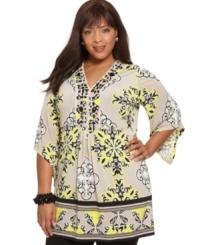 Punch up your casual style with Alfani's three-quarter sleeve plus size tunic top, finished by a beaded neckline and spirited print. (Clearance) Punch up your casual style with Alfani's three-quarter sleeve plus size tunic top, finished by a beaded neckline and spirited print. (Clearance)