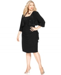 This plus size special occasion ensemble from Alex Evenings features a stunning, cape-like jacket and ruffled dress with matching beading.
