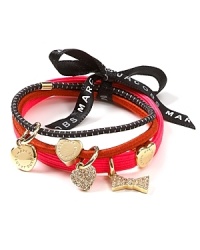 A set of three stylish hair elastics with signature MARC BY MARC JACOBS charms. A set of three stylish hair elastics with signature MARC BY MARC JACOBS charms.
