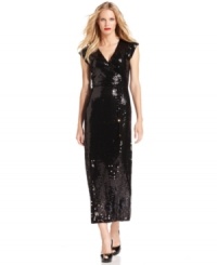MICHAEL Michael Kors' dress glows with shimmering sequins from top to bottom and a flattering faux-wrap silhouette. MICHAEL Michael Kors' dress glows with shimmering sequins from top to bottom and a flattering faux-wrap silhouette.