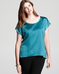 Sumptuous silk lends elegant movement to a vibrant Eileen Fisher Plus blouse. Let the style pop against crisp, black suiting for corner-office chic. Sumptuous silk lends elegant movement to a vibrant Eileen Fisher Plus blouse. Let the style pop against crisp, black suiting for corner-office chic.
