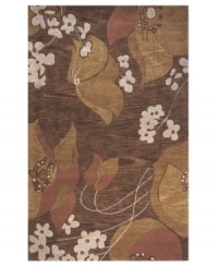 A garden of whimsical flowers gives this rug its graceful allure. Hand-tufted of luxuriously soft wool, this inviting piece fills your space with warm tones from end to end. Hand-carving enhances the composition with a slightly textured surface feel. A garden of whimsical flowers gives this rug its graceful allure. Hand-tufted of luxuriously soft wool, this inviting piece fills your space with warm tones from end to end. Hand-carving enhances the composition with a slightly textured surface feel.