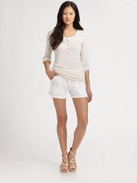 Subtle ribbing and three-quarter roll-tab sleeves characterize this soft button-down classic. ScoopneckButtoned frontThree-quarter roll-tab sleeves44% polyester/28% supima cotton/28% micro modalMachine washMade in USAModel shown is 5'9½ (176cm) wearing US size Small. Subtle ribbing and three-quarter roll-tab sleeves characterize this soft button-down classic. ScoopneckButtoned frontThree-quarter roll-tab sleeves44% polyester/28% supima cotton/28% micro modalMachine washMade in USAModel shown is 5'9½ (176cm) wearing US size Small.
