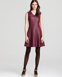 A natural-born traffic stopper, this leather Nanette Lepore dress is beautifully structured to flatter from every angle. A natural-born traffic stopper, this leather Nanette Lepore dress is beautifully structured to flatter from every angle.