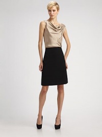 A polished woven design tailored with a hint of stretch for a perfect fit.Smooth front Side zipper Back waist pleats Inverted back pleat at hem About 22 long 97% polyester/3% spandex Dry clean Imported A polished woven design tailored with a hint of stretch for a perfect fit.Smooth front Side zipper Back waist pleats Inverted back pleat at hem About 22 long 97% polyester/3% spandex Dry clean Imported