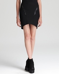 Bring edge to your wardrobe essentials with Helmut Lang's chic skirt with high-low hemline and luxe leather trims. Bring edge to your wardrobe essentials with Helmut Lang's chic skirt with high-low hemline and luxe leather trims.