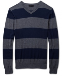 Soft and warm cotton and cashmere blend together to make this handsome striped sweater by DKNY Jeans. Soft and warm cotton and cashmere blend together to make this handsome striped sweater by DKNY Jeans.