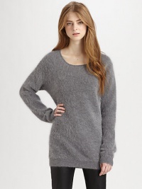 Ultra-cozy fine angora blend with an elongated hemline for superior comfort. ScoopneckDropped shouldersLong dolman sleevesRibbed trim at the neckline, cuffs and hemAbout 22 from shoulder to hem70% angora/30% nylonDry cleanImportedModel shown is 5'10 (177cm) wearing US size Small. Ultra-cozy fine angora blend with an elongated hemline for superior comfort. ScoopneckDropped shouldersLong dolman sleevesRibbed trim at the neckline, cuffs and hemAbout 22 from shoulder to hem70% angora/30% nylonDry cleanImportedModel shown is 5'10 (177cm) wearing US size Small.