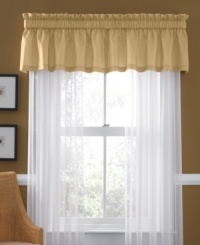 The Dune Blossoms window treatments from Martha Stewart Collection feature a classic gold pleated valance and smooth white sheers. When paired with the Dune Blossoms 24 piece room in a bag, the overall look is as calm and relaxing as drifting sand. (Clearance)